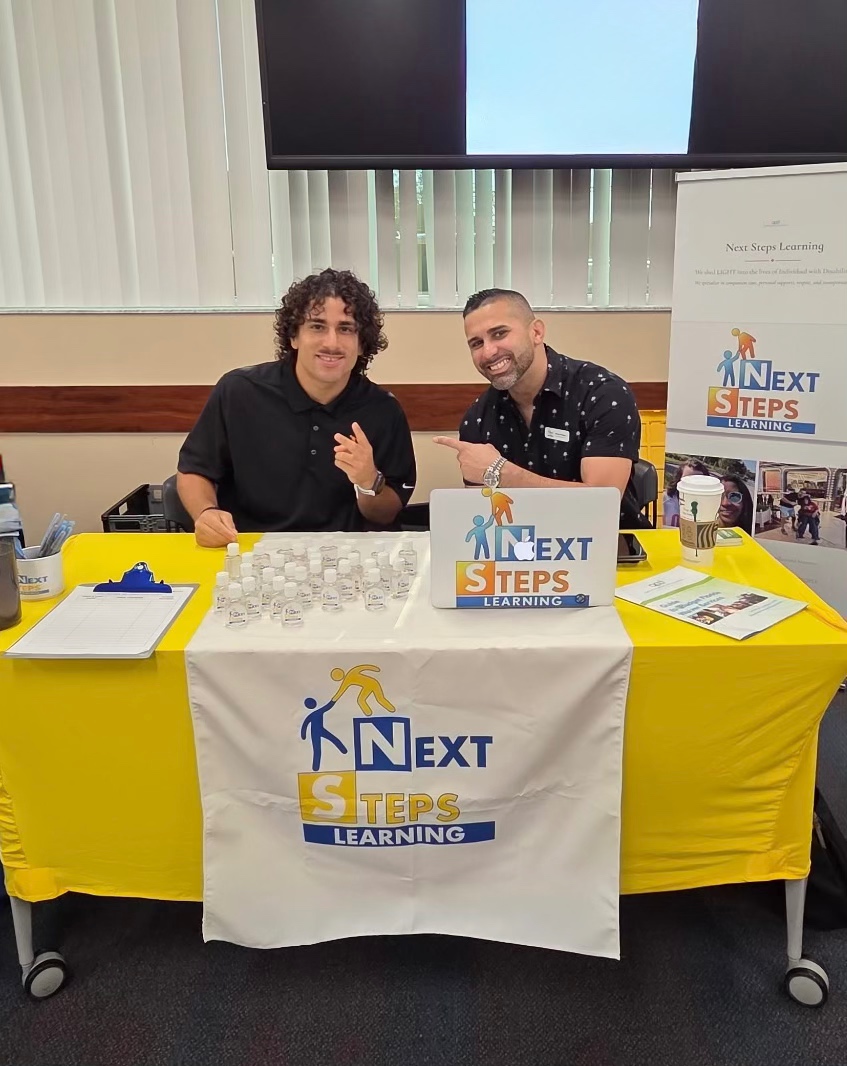 Two Next Steps Learning representatives at a Tampa Bay community event